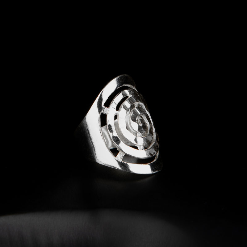 Ring with spiral embossment